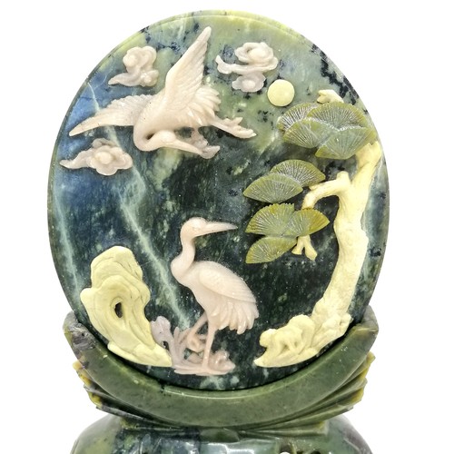 448 - Chinese jade oval panel set with hardstone scene depicting cranes in a pastoral scene on a stand ~ b... 
