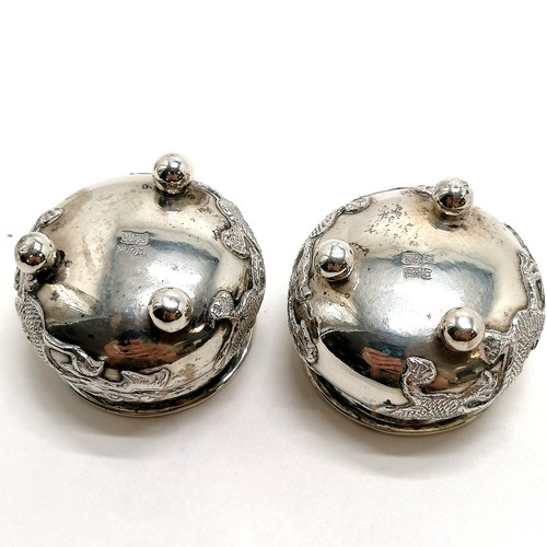 482 - 3 x Chinese silver (900 quality) salts (pair + 1 matched) decorated with a dragon & with clear glass... 