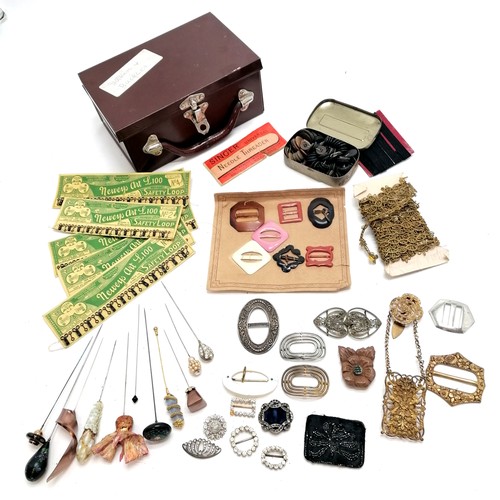 489 - Vintage tin mini suitcase containing unused Neweys safety loops on cards, Singer needle threader, an... 