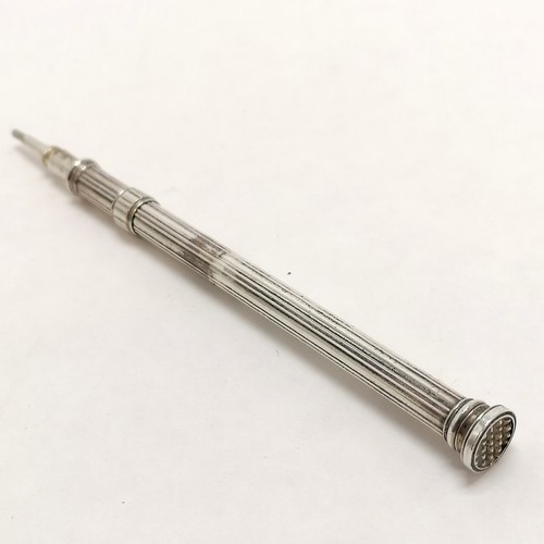 497 - Unmarked silver propelling pencil by G Riddle (marks worn) with crosshatched seal end - 10.5cm exten... 