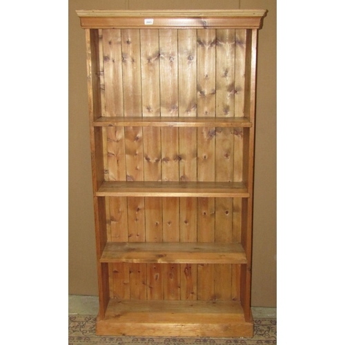 2003 - A rustic reclaimed pine freestanding open bookcase with fixed shelves and tongue and groove boarded ... 