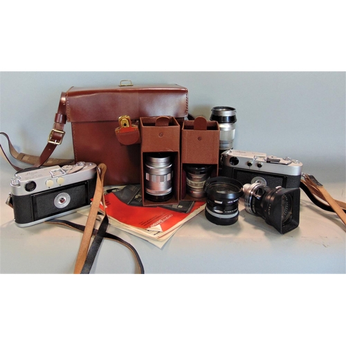 656 - A collection of vintage Leica cameras and lenses to include DBP M4-1273 151, DBP M2 1112496, 1:4/135... 