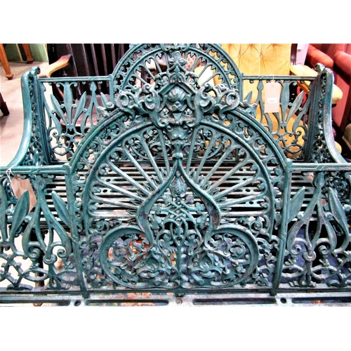 2223 - A pair of good quality heavy cast iron peacock pattern garden benches with decorative pierced detail... 