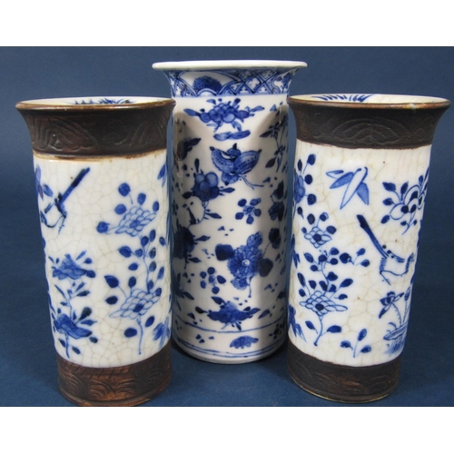 50 - A 19th century oriental vase of cylindrical form with blue and white painted bird and floral decorat... 