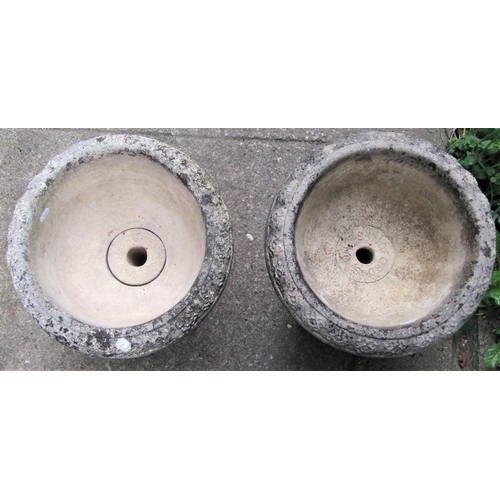 1509 - A pair of reclaimed Sandford stone garden urns, with flared repeating banded rims, lobed bowls, flut... 