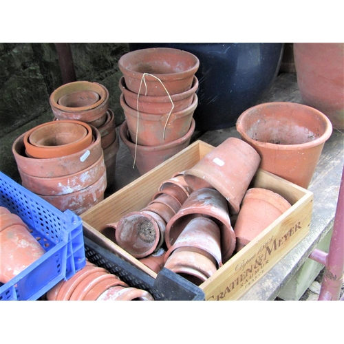 1524 - Approx 150+ small reclaimed terracotta flower pots of varying size, some af, the largest 18cm and sm... 