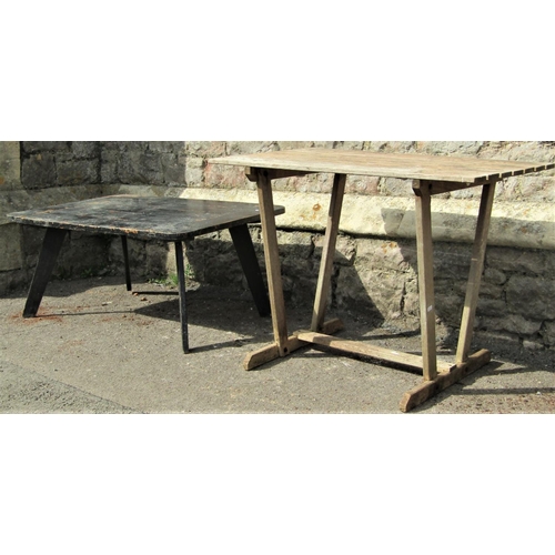 1503 - An unusual weathered Lister teak garden table, with rectangular slatted top, angular supports and sl... 