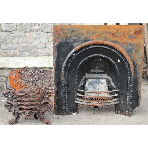 1528 - A small reclaimed cast iron fire basket, with scrolling dragon, shell and lattice detail, 54cm (full... 