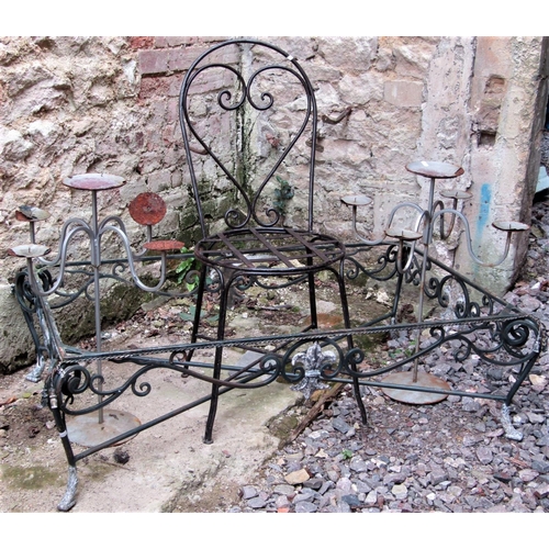 1540 - A heavy gauge ironwork single hoop back garden chair with circular pierced lattice seat, together wi... 