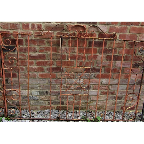 1538 - A pair of reclaimed ironwork entrance gates, with S and C scroll panels, 3.7m wide (af)