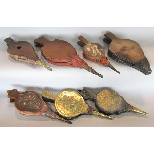 Seven pairs of bellows 19th century and later, in hard wood,... | Barnebys