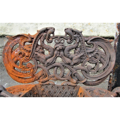 2023 - A small reclaimed cast iron fire basket, with scrolling dragon, shell and lattice detail, 54cm (full... 