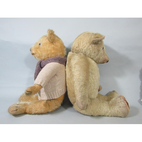 12 - 2 early to mid 20th century teddy bears the larger probably by Chiltern, both with glass eyes, stitc... 
