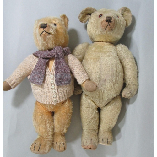 12 - 2 early to mid 20th century teddy bears the larger probably by Chiltern, both with glass eyes, stitc... 