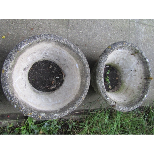 2005 - A pair of reclaimed garden planters of circular tapered form with fruiting swag detail (af), 50 cm i... 