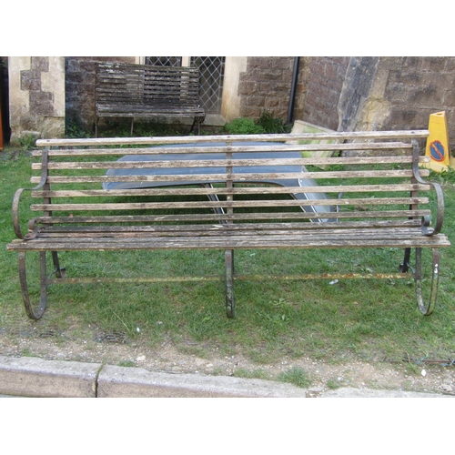 2015 - An old park/long garden bench with weathered timber lathes raised on sprung steel supports, (af), 7f... 