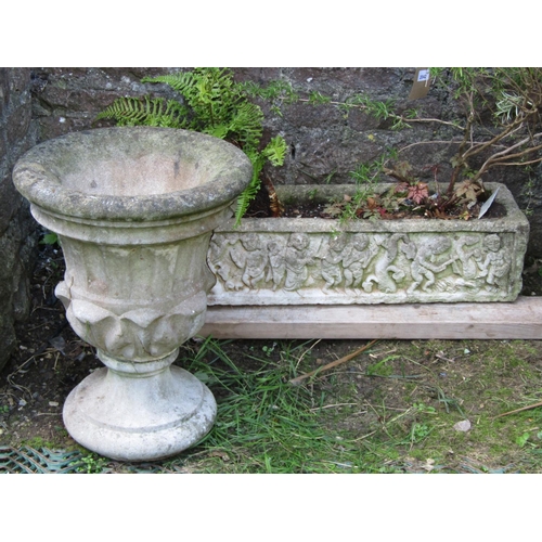 2042 - A reclaimed garden planter of rectangular form with raised relief detail/frieze of mediaeval style c... 