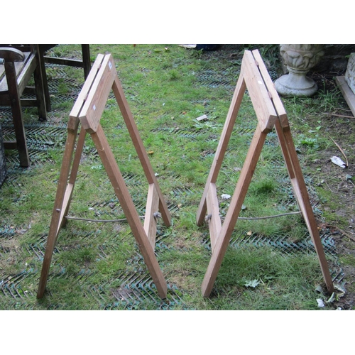 2045 - A pair of simple stripped pine folding trestles together with two weathered directors type chairs (4... 