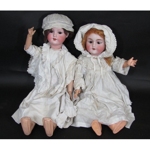 25 - 2 early 20th century German bisque head dolls; the taller doll 67cm has head by Armand Marseille, br... 