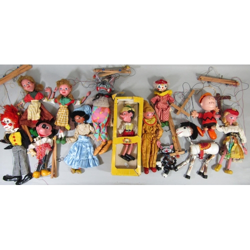 49 - Collection of vintage puppets including boxed Pelham Pinocchio, unboxed cat, mule, clowns, Minnie Mo... 