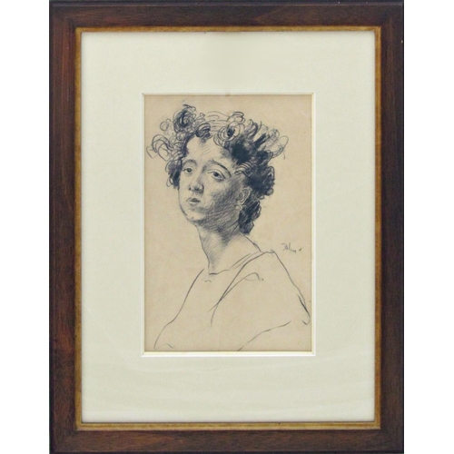 26 - Augustus John (1878-1961) - Bust portrait of a girl, signed, charcoal on paper, 27 x 18cm, framed