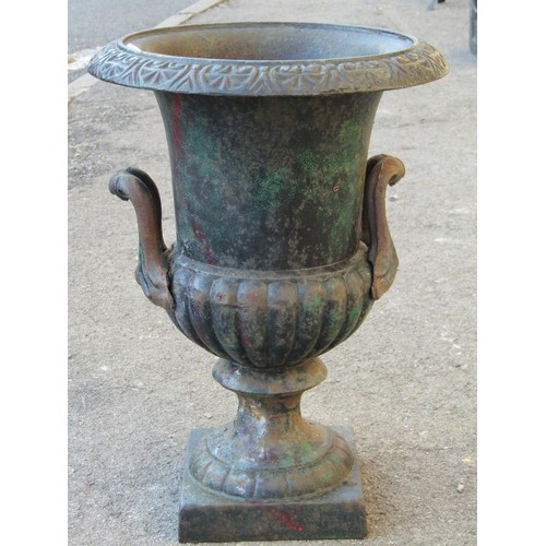 2046 - A small reproduction cast iron campana shaped urn with flared rim, lobed body and square base, 32 cm... 