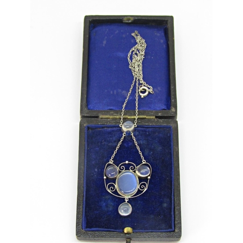 Arts & Crafts silver necklace with cabochon moonstone pendant and filigree detail, top stone to bottom stone 5.8cm approx