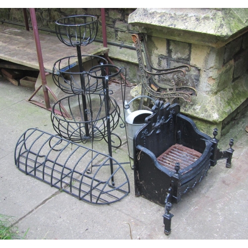 2004 - A coated light steel planter on three graduated open circular basket tiers raised on simple scrolled... 
