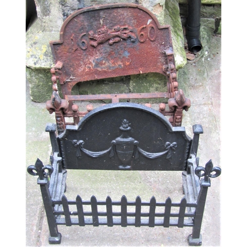 2015 - An old English style cast iron fire basket with raised back with rampant lion and dated 1660 (af) to... 