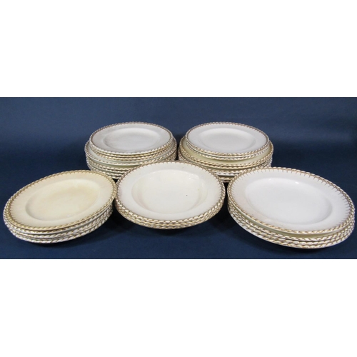 1002 - A collection of 19th century Mintons plates and soup plates of various size, all with gilt rope twis... 