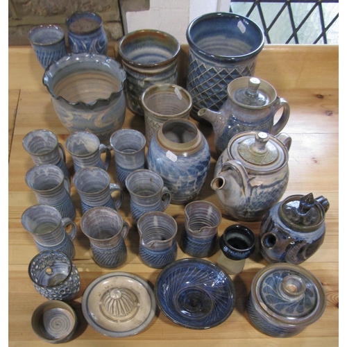 1011 - A quantity of studio pottery wares all with glaze in tones of blue and all probably from the Anvil P... 