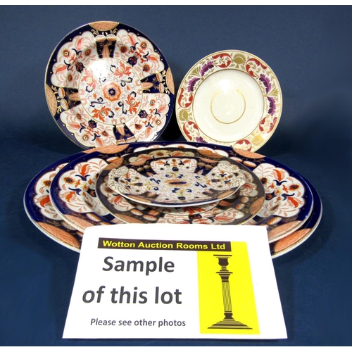 1030 - A collection of 19th century Ironstone China dinner wares comprising a large oval meat plate with we... 