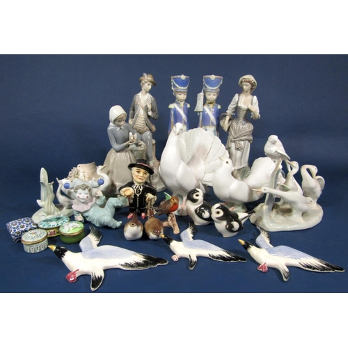 1040 - A collection of Lladro figures including male and female characters, a pair of soldiers (one af) a g... 