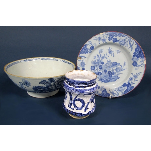 1048 - An unusual tin glazed pottery beaker of waisted form, with blue painted date 1674 and initials A.T.S... 