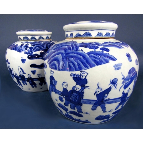 1051 - A pair of oriental blue and white painted ginger jars and covers with decoration of boys playing, fl... 