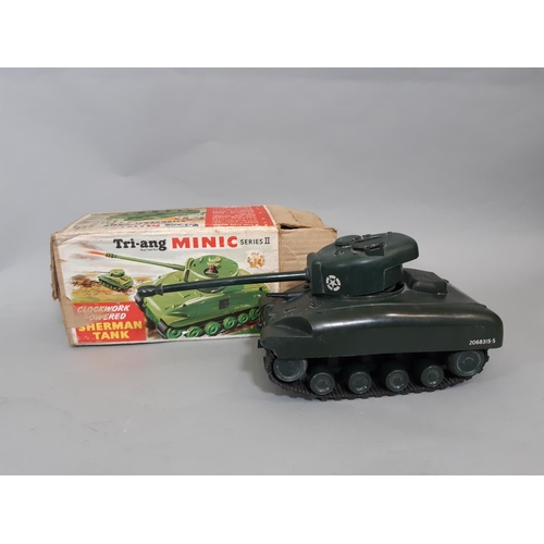 23 - Mixed collection of model vehicles including boxed Minic clockwork Sherman tank by Tri-ang (no key),... 