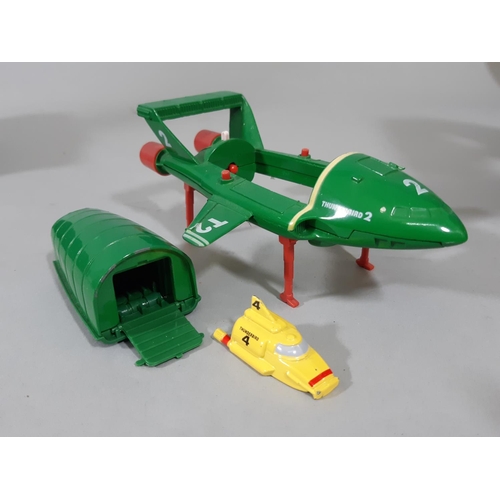 41 - Thunderbird 1, 2 (containing 4) and 3 model vehicles from Thunderbirds TV show,  by Carlton, large s... 