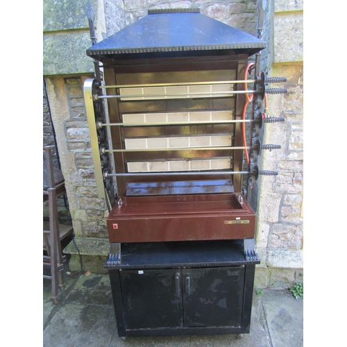 A Eurast Uni commercial gas chicken rotisserie, attachments and two door cabinet, main unit 112cm wide x 164cm high