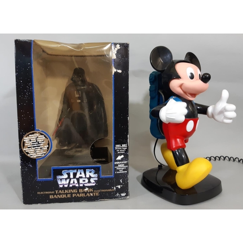 49 - Mickey Mouse telephone by Tyco together with a boxed Star Wars Electronic Talking Bank (both unteste... 