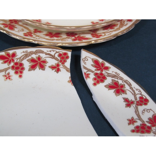 1026 - A collection of Tuscan China teawares with red and gilt fruiting vine decoration including milk jug,... 