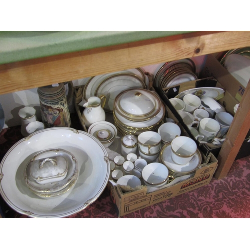 56 - A quantity of Cauldon white glazed dinner and teawares with gilt Greek key border decoration includi... 