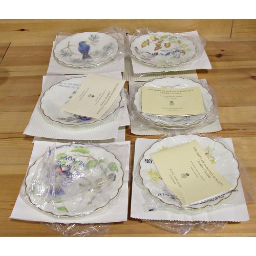 32 - A set of twelve Royal Worcester limited edition dessert plates from the Birds of Dorothy Doughty ser... 
