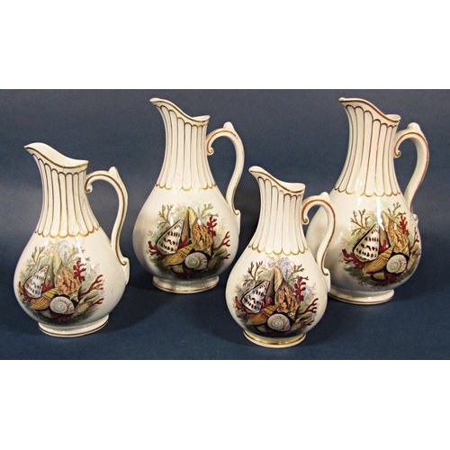 62 - A pair of 19th century Pratt ware jugs with printed shell and coral detail, 26cm tall, together with... 