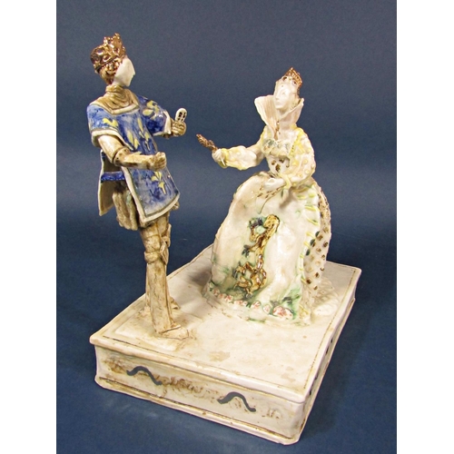64 - A Jackie Giron studio pottery group of the Queen of Hearts and her Knave, with incised mark to base ... 