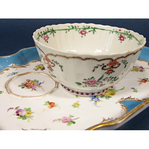 65 - A small collection of late 18th century porcelain comprising a tea bowl and saucer with famille rose... 
