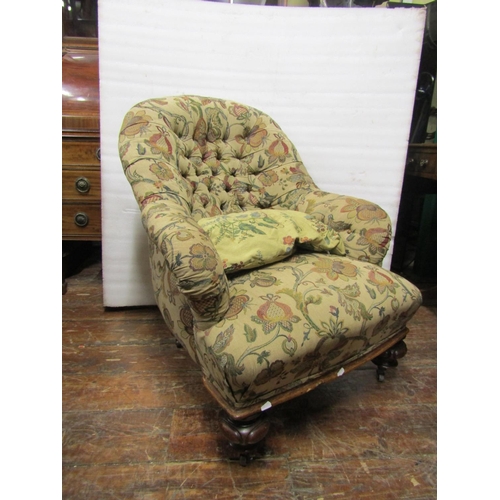 A Victorian drawing room chair on turned mahogany supports, Barnebys