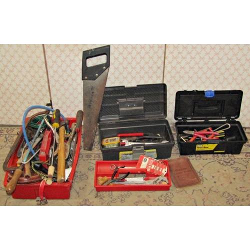 A box of various assorted hand tools