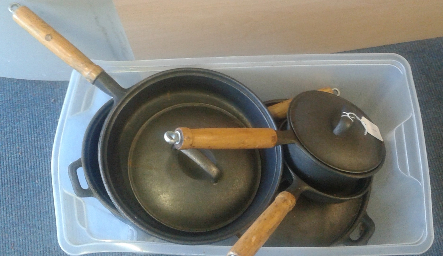Collection of Six Cast Iron Pots and Pans with Interchangeable Lids
