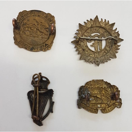 12 - Collection of Various Irish Defence Forces Cap Badges (12)