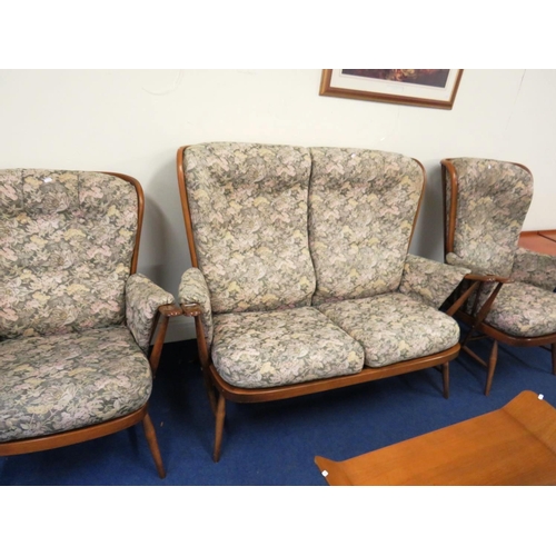 A Vintage Ercol Sofa And Two Arm Chairs